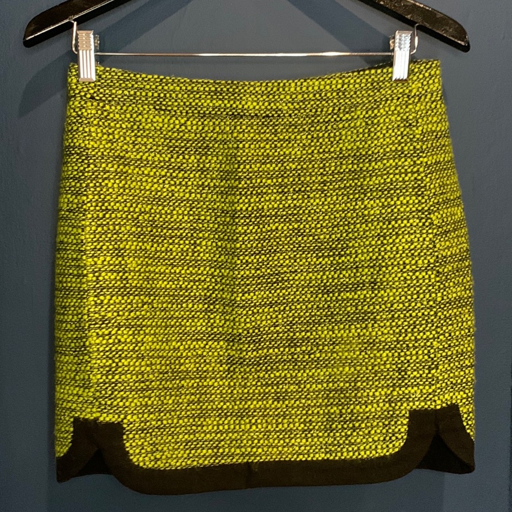 Neon green and black with sparkly thread throughout.